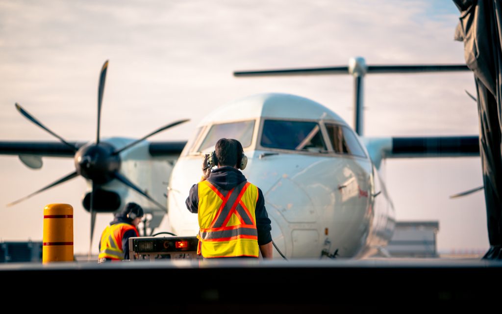 man-standing-in-front-of-airplane-3459336